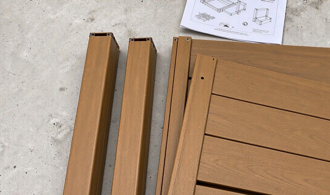 Raised garden bed flat-pack kit components laid out